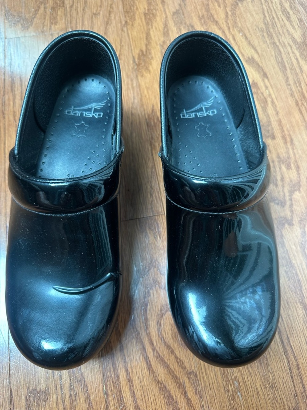 Dansko Black Patent Clogs